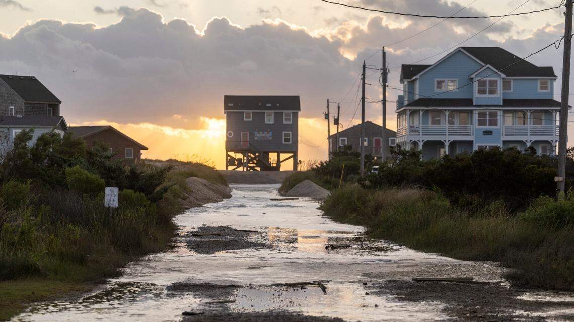 The Fifth National Climate Assessment warns that climate change is having measurable impacts nationwide now and that immediate action is needed to avoid its worst impacts. This photo shows ocean overwash settling in the street behind oceanfront homes in Rodanthe during a September storm.