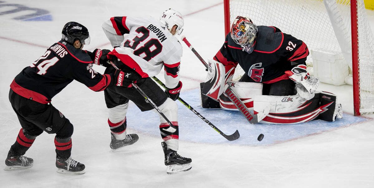 Carolina Hurricanes’ goalie Antii Raanta (32) stops a scoring attempt by Ottawa’s Patrick Brown (38) during the third period on Tuesday, April 4, 2023 at PNC Arena in Raleigh, N.C. Raanta had 26 saves in the Hurricanes’ 3-2 victory.