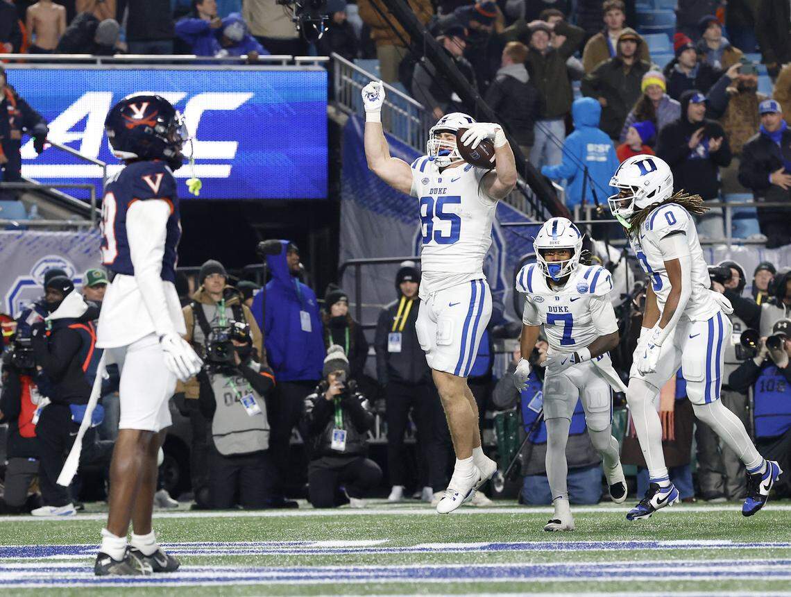 Duke’s Jeremiah Hasley celebrates after scoring a touchdown during overtime of the Blue Devils’ 27-20 win over Virginia in the ACC Football Championship on Saturday, Dec. 6, 2025, at Bank of America Stadium in Charlotte, N.C.