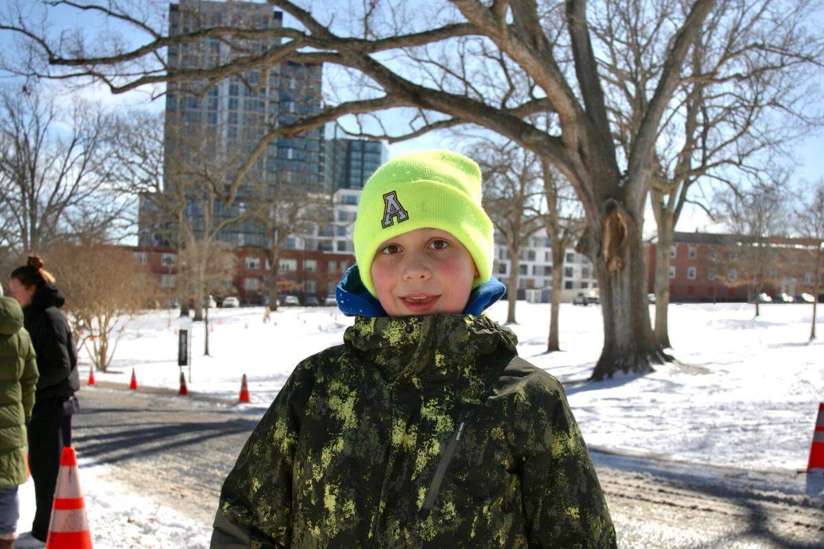 Wade Baum in a brief moment between sled rides at Dix Park on Sunday, Feb. 1.