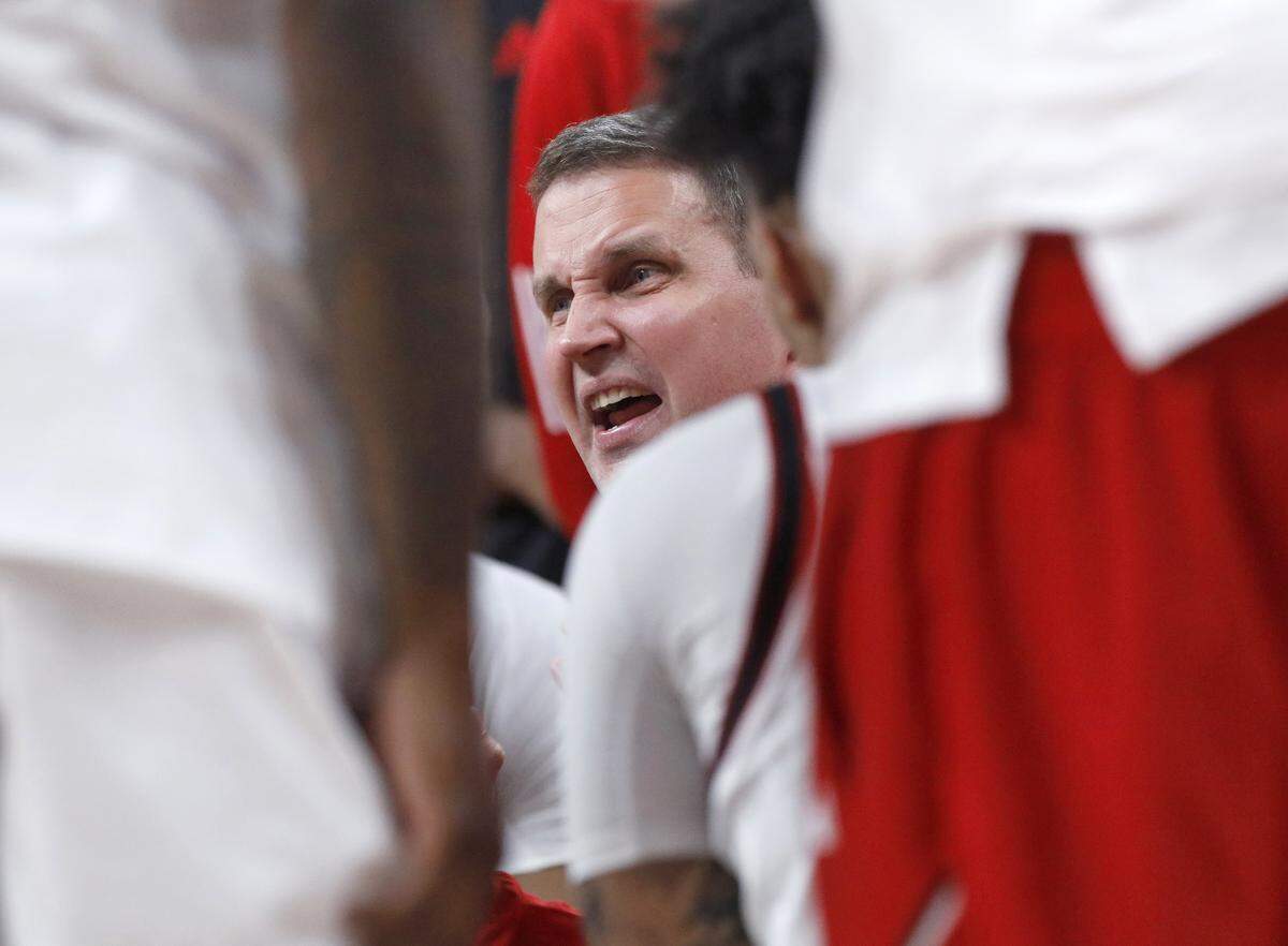 N.C. State head coach Will Wade speaks with his team during the second half of the Wolfpack’s 76-61 loss to Virginia on Saturday, Jan. 3, 2026, at Lenovo Center in Raleigh, N.C.