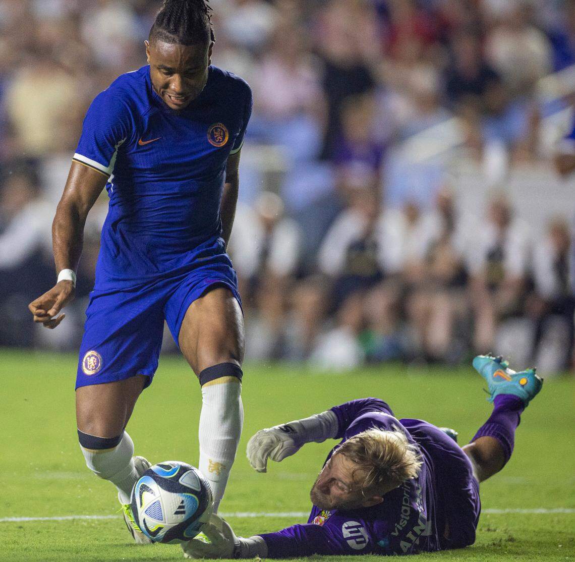 Chelsea’s Christopher Nkunku (45) scores on Wrexham goalie Rob Lainton (1) to take a 4-0 lead in the second half during their FC Series game on Wednesday, July 19, 2023 in Chapel Hill, N.C.