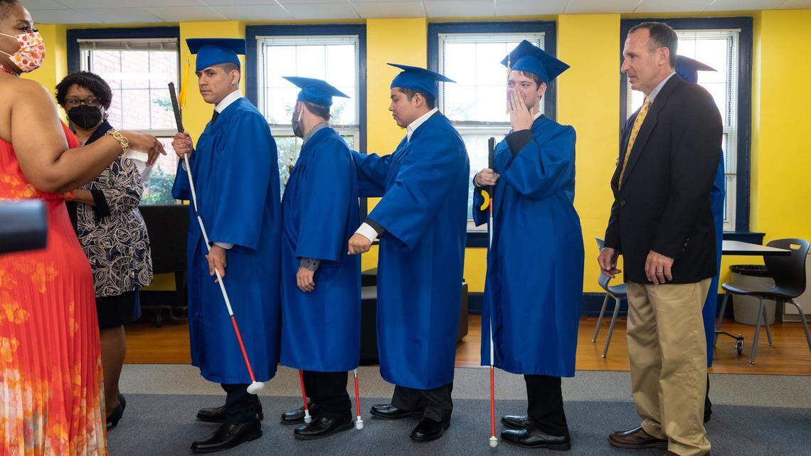 Class of 2022 Graduates wait in line before entering the auditorium for the Governor Morehead School’s Commencement Ceremony at Lineberry Hall in Raleigh, N.C. on Friday, June 3, 2022. Students come from across the state to the K-12 school for its education services for the deaf and visually impaired.