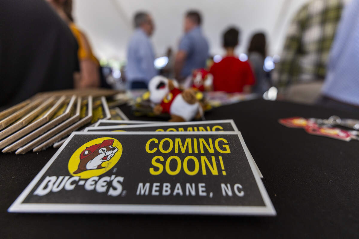 Buc-ee's branded gifts are displayed on a table during a groundbreaking ceremony for a new Buc-ee's travel center on Wednesday, June 10, 2026, off Exit 152 on Interstates 85 and 40 in Mebane. The Texas-based company plans to build a 74,000-square-foot store that could open by the end of 2027, featuring 120 fuel pumps, 650 parking spaces and 24 electric vehicle charging stations.