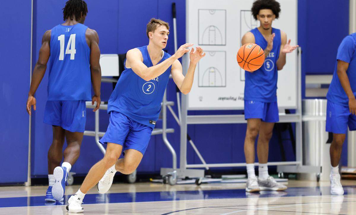 Duke’s Cooper Flagg (2) pulls in the pass during practice in Durham, N.C., Friday, Sept. 27, 2024.