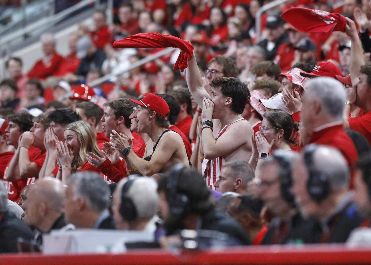 N.C. State fans cheer during the second half of the Wolfpack’s 82-58 win over North Carolina on Tuesday, Feb. 17, 2026, at Lenovo Center in Raleigh, N.C.