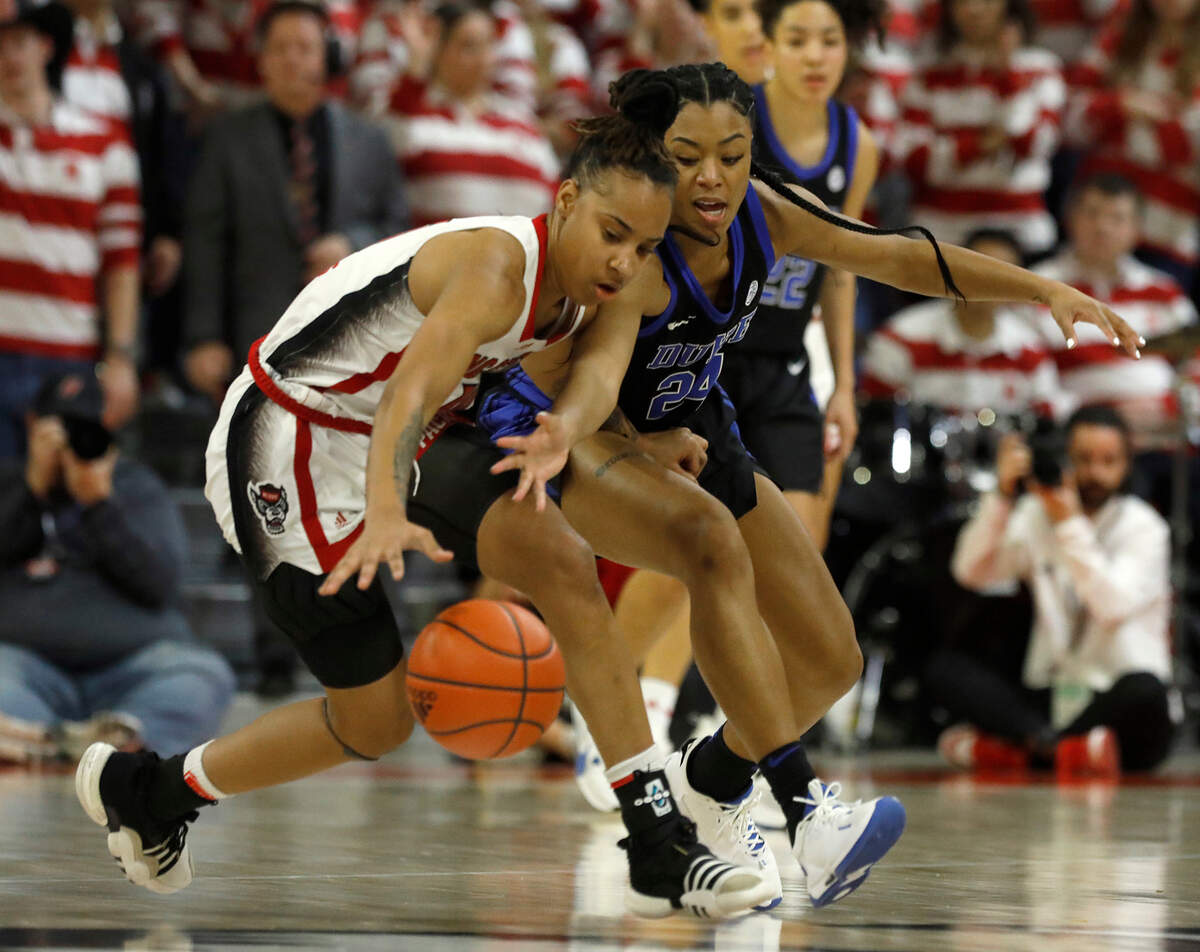 Duke’s Reigan Richardson pressures N.C. State’s Aziaha James during the first half of the Wolfpack’s game on Sunday, Jan. 21, 2024, at Reynolds Coliseum in Raleigh, N.C.