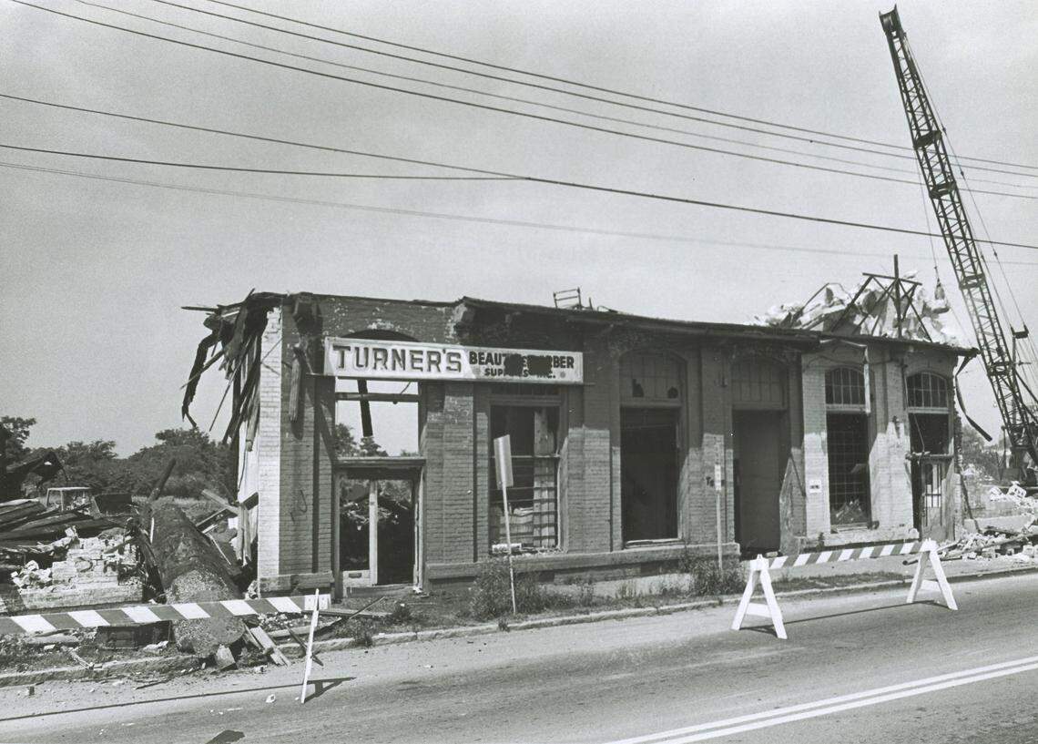 File Photo from July 8, 1979 showing the business of Joseph Scott, Anita Scott Neville’s father, being torn down in the Hayti business district; along E. Pettigrew St., to make room for the East-West Expressway.