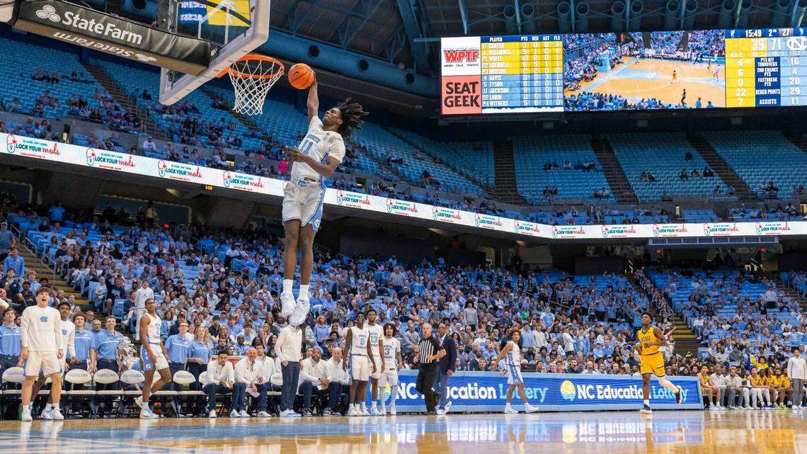 North Carolina guard Ian Jackson (11) glides to the basket for an acrobatic dunk during the second half against Johnson C. Smith on Sunday, October 27, 2024 at the Smith Center in Chapel Hill, N.C. Jackson lead all scores with 21 points in the Tar Heels’ 127-63 victory.