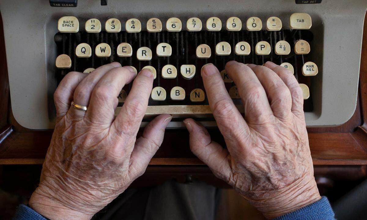 A.C Snow, former Editor of the Raleigh Times, poses with his trusty Royal Typewriter in his home on January 15, 2020 in Raleigh, N.C.