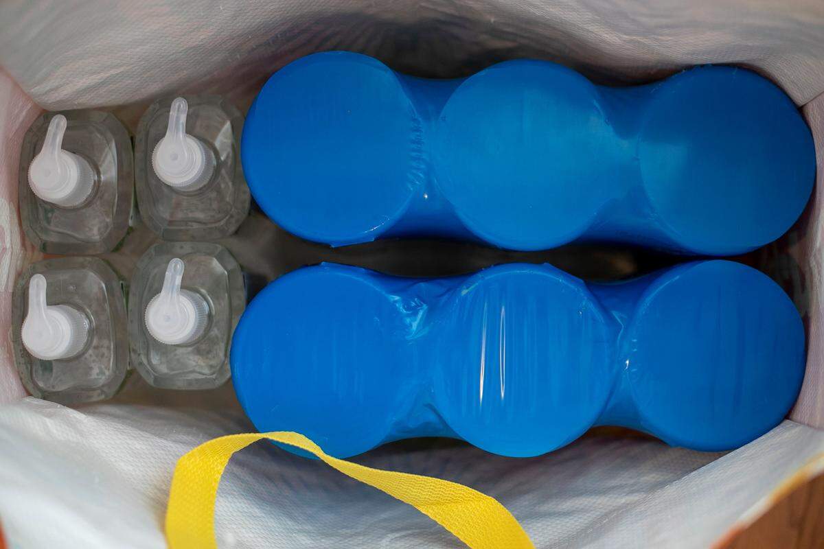 Katie Williams has a a large supply of disinfectant wipes and hand sanitizer that she has purchased to send to school with her daughter when Wake County Schools return to in-person learning amid the surge in COVID-19 cases.