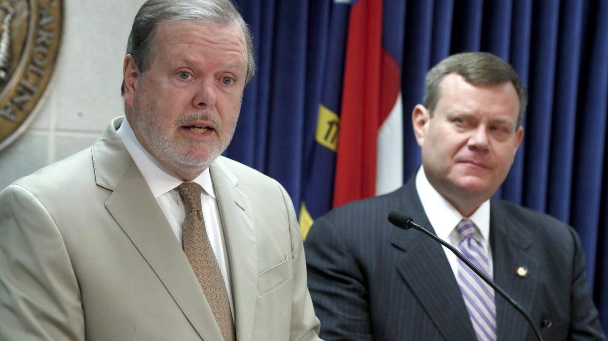 N.C. Senate President Pro Tem Phil Berger, left, and N.C. House Speaker Tim Moore are backing six state constitutional amendments, including two that would reduce the governor’s appointment power. Gov. Roy Cooper has sued to keep the two amendments off the November ballot.