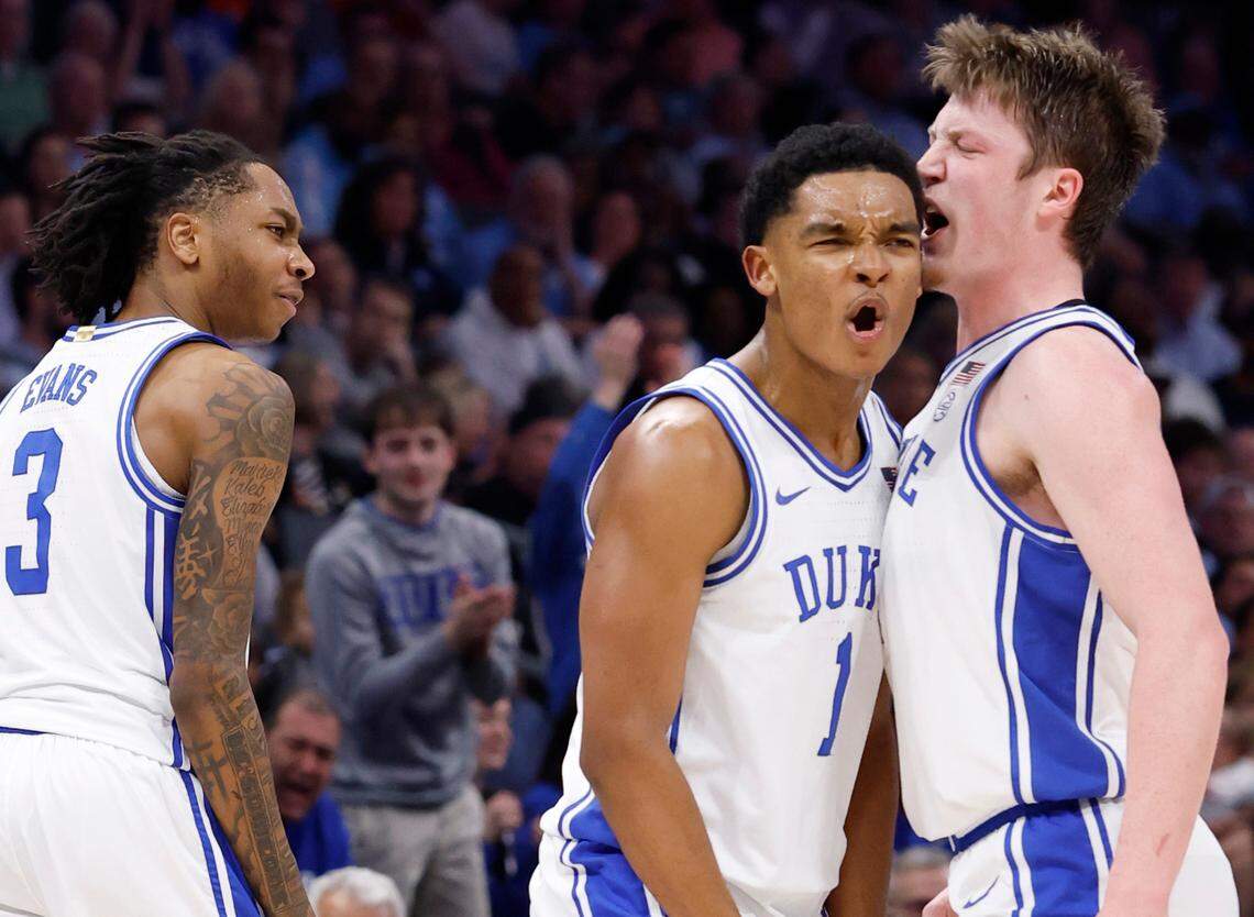 Duke’s Caleb Foster (1) celebrates with Kon Knueppel (7) during the first half of Duke’s game against UNC in the semifinals of the 2025 ACC Men’s Basketball Tournament at the Spectrum Center in Charlotte, N.C., Friday, March 14, 2025.