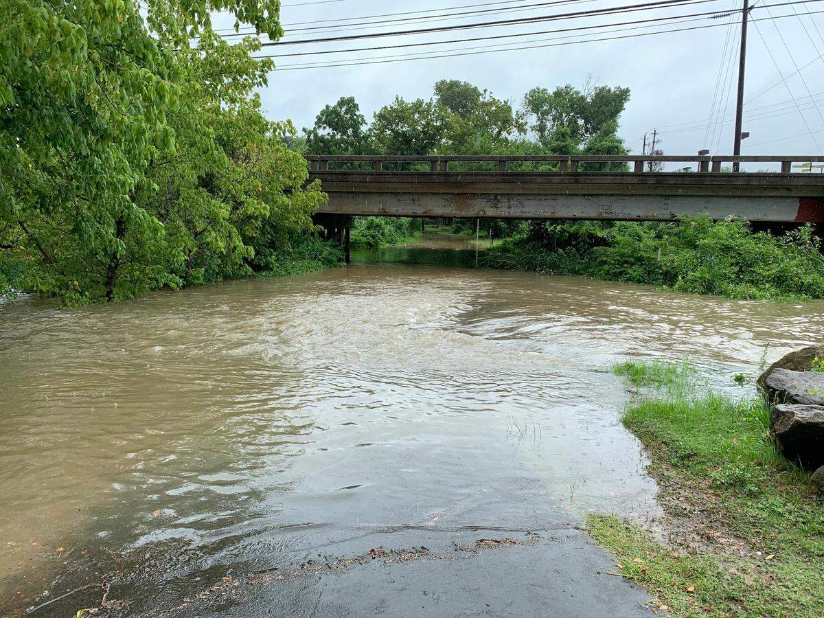 The water level in Crabtree Creek at Wake Forest Road increased by several feet after hours of non-stop rain from Tropical Storm Elsa on Thursday, July 8, 2021.