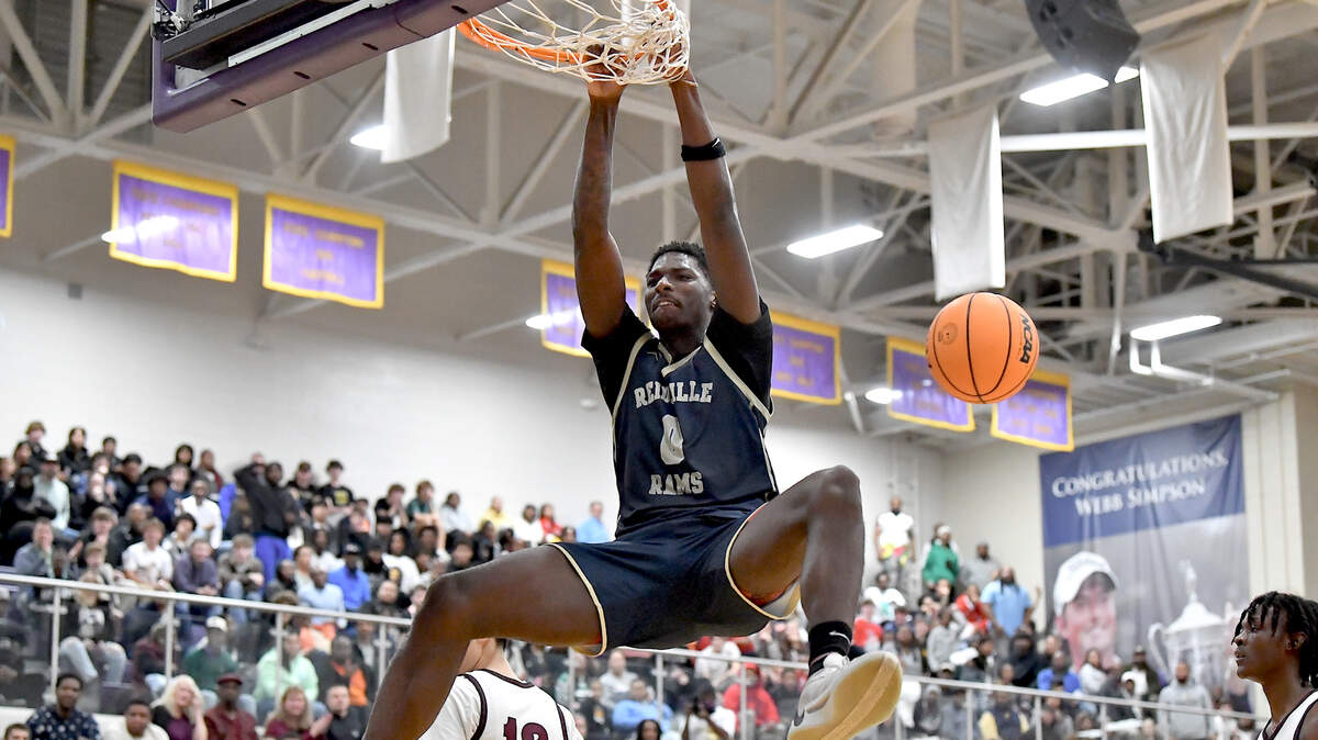 Reidsville’s Kendre Harrison (0) dunks the ball in a pause of the game with St. Anne’s Belfield during the first half. The Reidsville Rams and the St. Anne -Belfield (VA) Saints met in the finals of the Day’Ron bracket of the John Wall Holiday Invitational in Raleigh, N.C. on December 30. 2024.