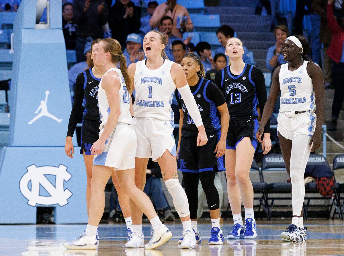 North Carolina’s Alyssa Ustby (1) celebrates with teammates at the conclusion of the Tar Heels’ 72-53 win over Kentucky on Thursday, Dec. 5, 2024, at Carmichael Arena in Chapel Hill, N.C.