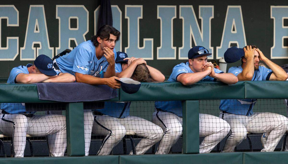 The North Carolina baseball team reacts as Arkansas scores the game winning run in the bottom of the ninth inning securing a 4-3 victory and clinching the NCAA Super Regional series on Sunday, June 12, 2022 at Boshamer Stadium in Chapel Hill, N.C.