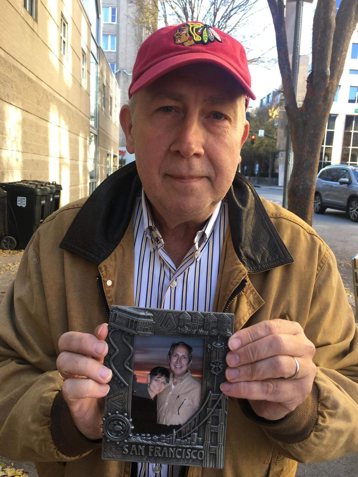 Ted Dann of Raleigh shows a picture of his wife, Maria, who was killed four months after their wedding when an intoxicated driver struck her car in Granville County.