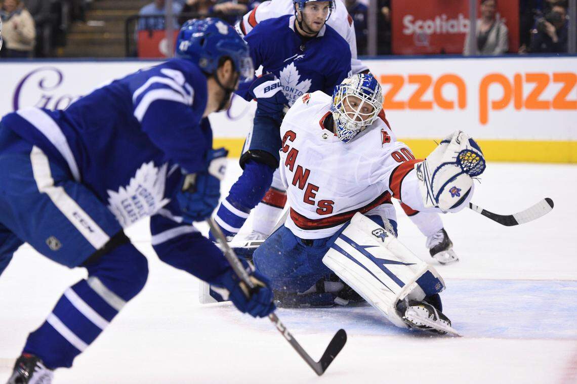 Toronto Maple Leafs left wing Pierre Engvall (47) scores his team’s third goal of the game against Carolina Hurricanes emergency goalie David Ayres (90) during second-period NHL hockey game action in Toronto, Saturday, Feb. 22, 2020.
