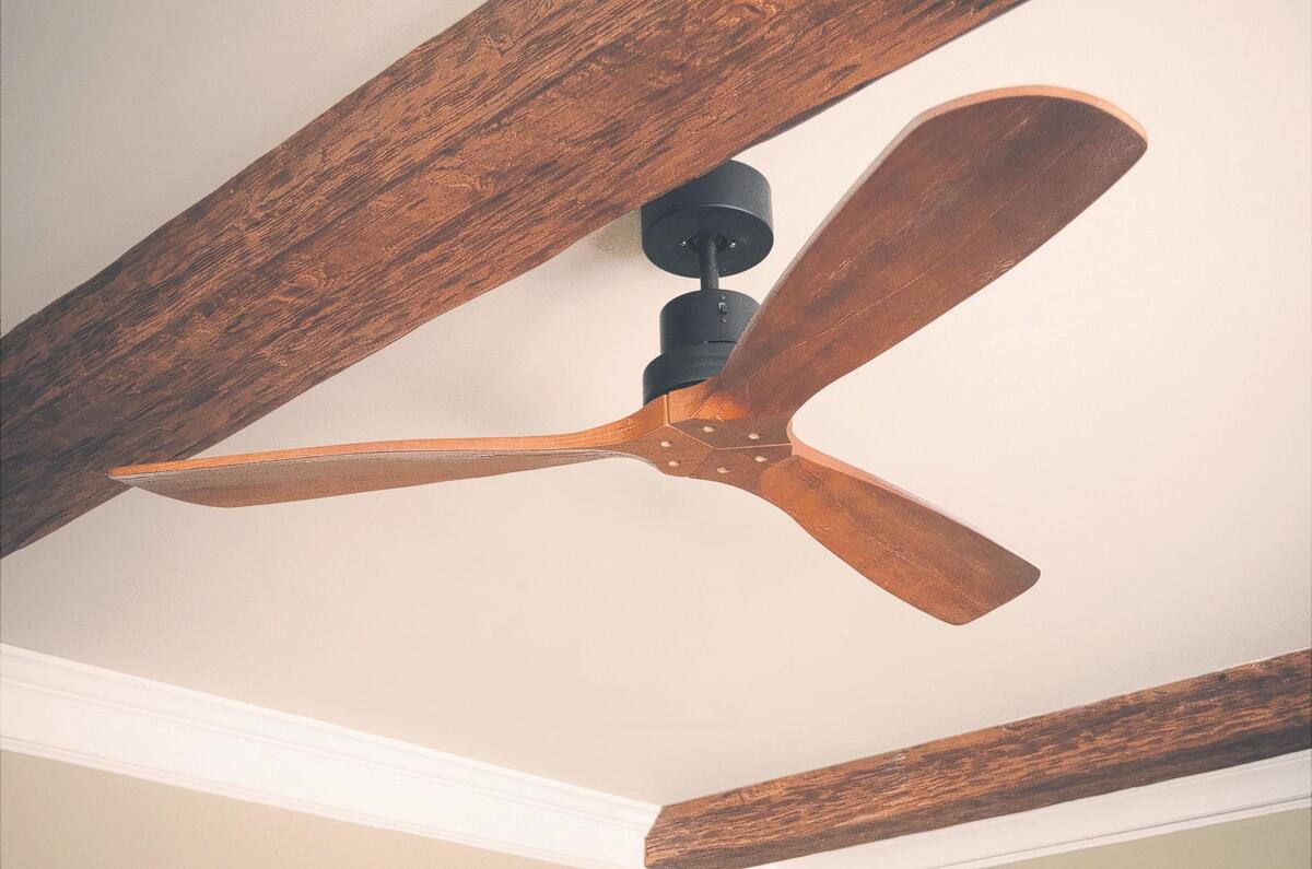 Adding rustic beams to the ceiling and an updated ceiling fan, are easy projects with high impact.