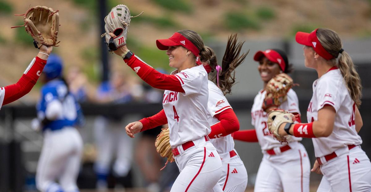 N.C. State outfielder Tori Ensley (4) is congratulated by teammates after throwing out Duke’s Amiah Burgess at home in the first inning on Friday, April 25, 2025 at Dail Softball Stadium in Raleigh, N.C.