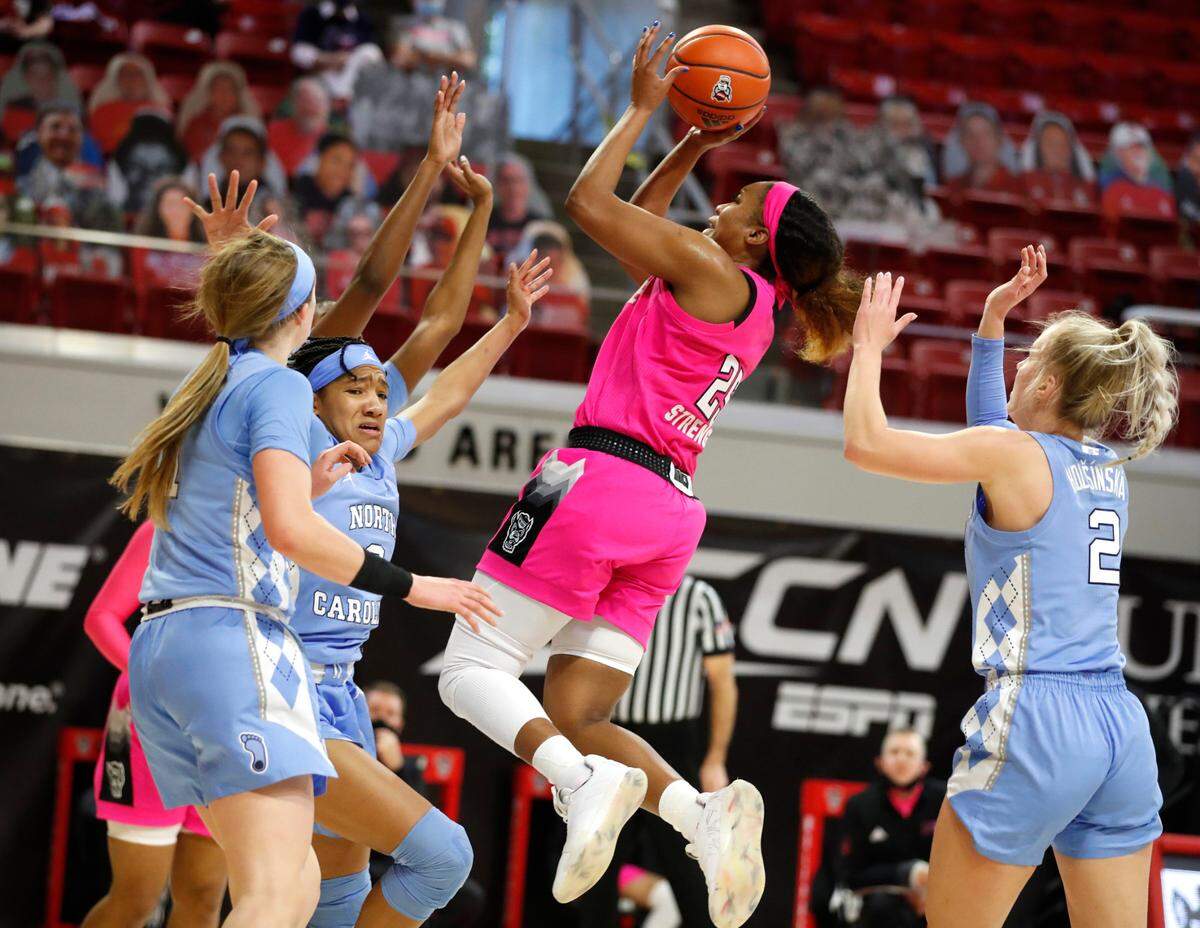 N.C. State’s Kayla Jones (25) shoots during the second half of N.C. State’s 82-63 victory over UNC in the annual Play4Kay game at Reynolds Coliseum in Raleigh, N.C., Sunday, February 21, 2021.
