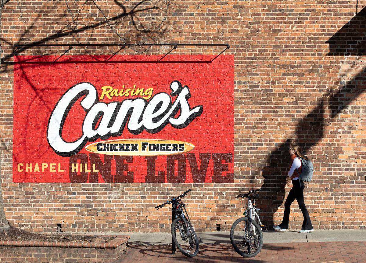 A person walks near the intersection of Columbia and Franklin Streets on Thursday, Jan. 11, 2024, in Chapel Hill, N.C.