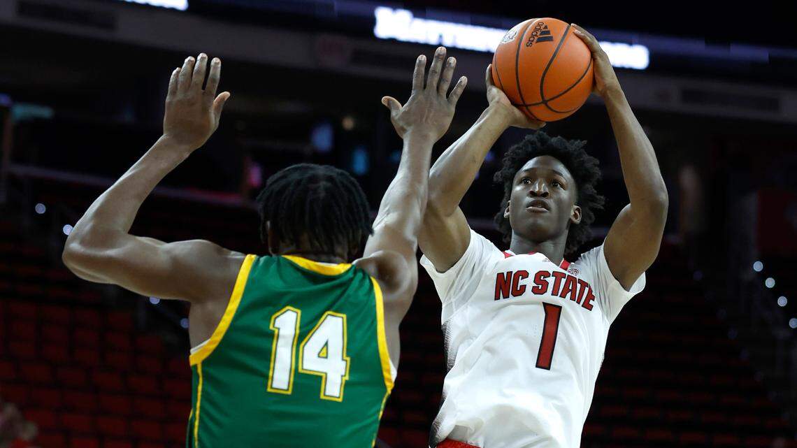 N.C. State’s Jarkel Joiner (1) shoots as Lees-McRae’s Williams Onyeodi (14) defends during the second half of N.C. State’s 107-59 victory over Lees-McRae in an exhibition game at PNC Arena in Raleigh, N.C. Wednesday, Nov. 2, 2022.