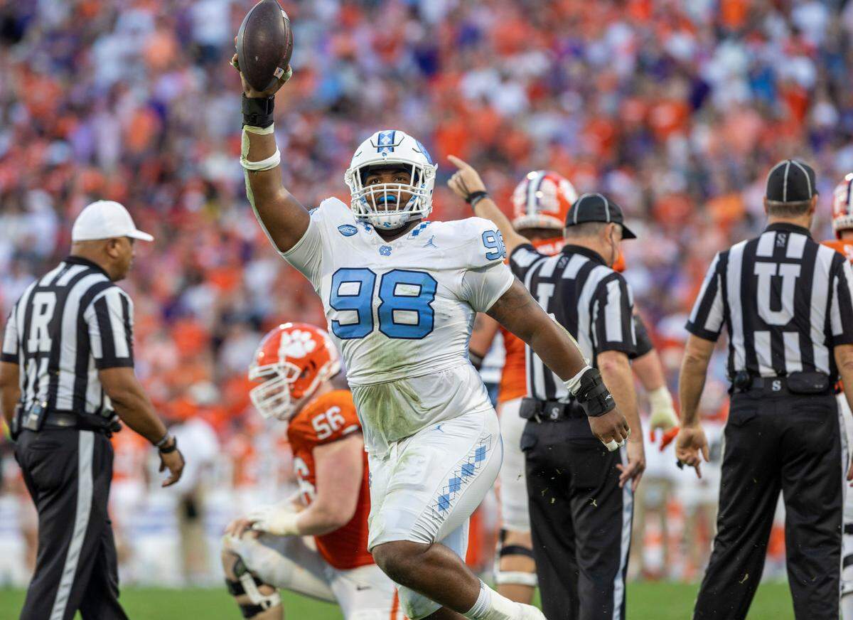 North Carolina’s Kevin Hester Jr. (98) reacts after recovering a fumble by Clemson’s Will Shipley in the second quarter on Saturday, November 18, 2023 at Memorial Stadium in Clemson, S.C.
