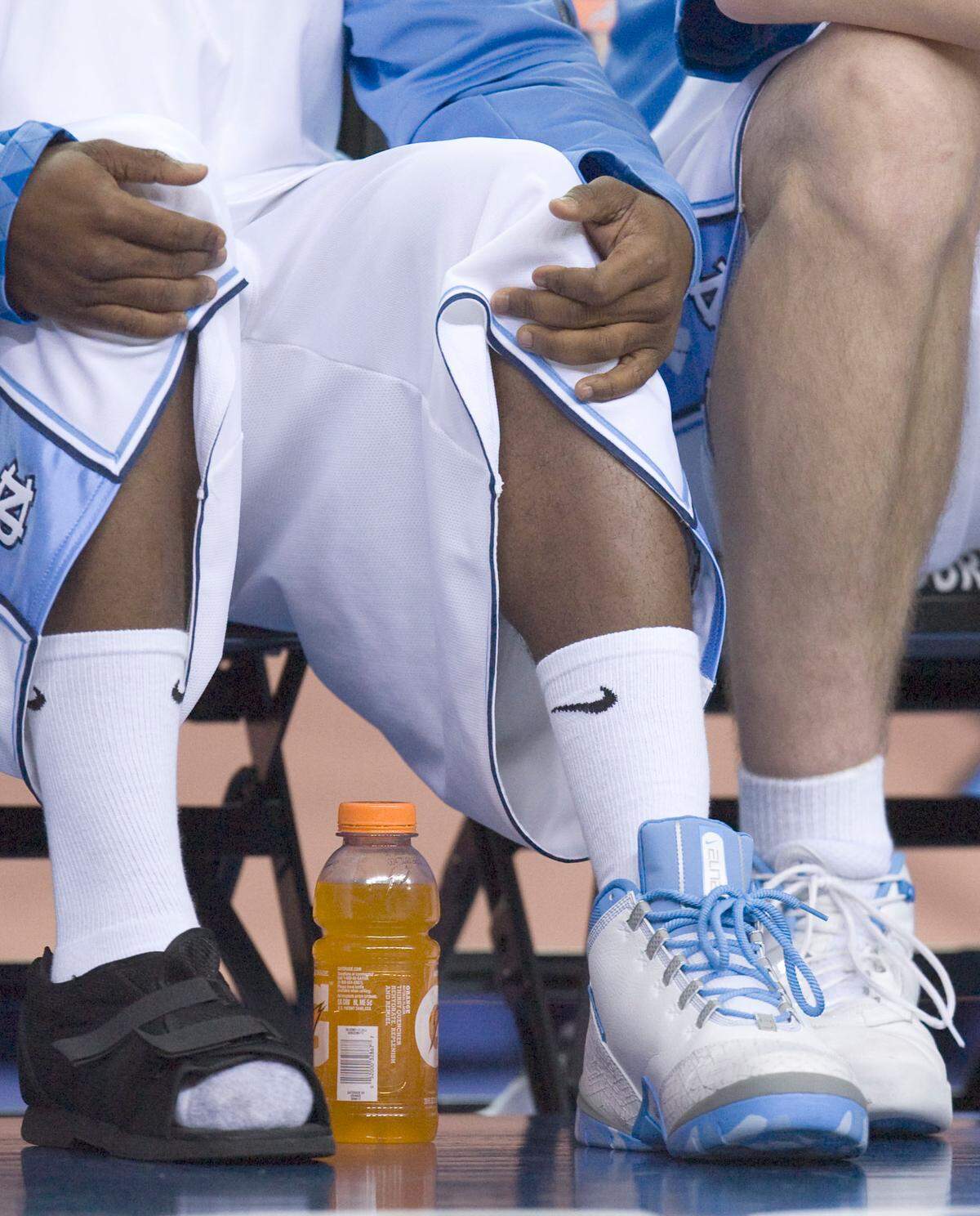 UNC’s Ty Lawson (5), out with an injured toe, wears a special shoe on the bench during on Saturday March 14, 2009 in the semi-finals of the ACC Tournament at the Georgia Dome. ROBERT WILLETT robert.willett@newsobserver.com