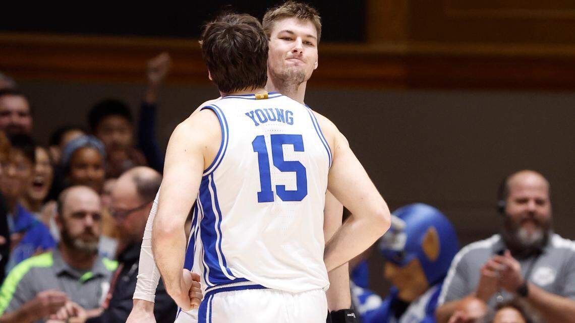 Duke’s Ryan Young (15) bumps chests with Kyle Filipowski (30) after a defensive stop during the second half of Duke’s 84-79 victory over Georgia Tech at Cameron Indoor Stadium in Durham, N.C., Saturday, Jan. 13, 2024.