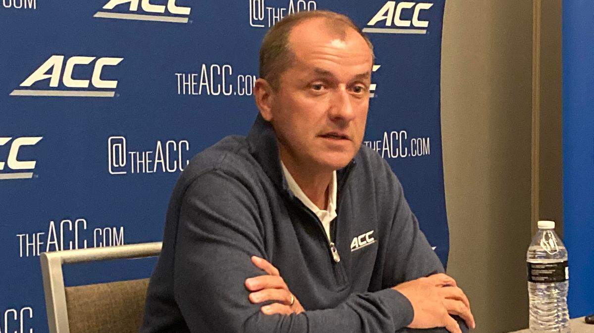 In this file photo, ACC commissioner Jim Phillips discusses some of the high points for the league during its 2022 spring meetings. One point of discussion was the possibility of eliminating the divisional format in football. (Matt Murschel/Orlando Sentinel/TNS)