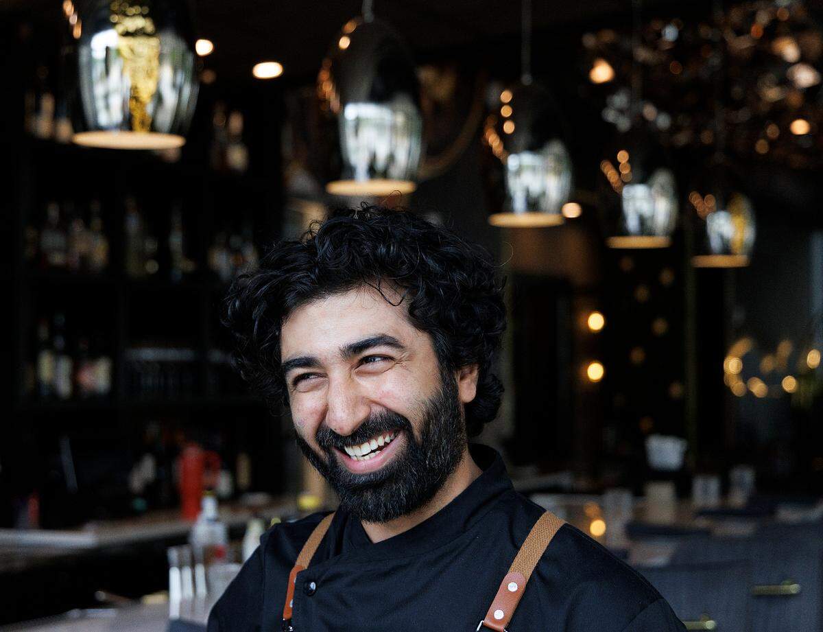 Bhavin Chhatwani, executive chef of Tamasha Modern Indian, smiles while talking about his experiences on Wednesday, May 8, 2024, in Raleigh, N.C.