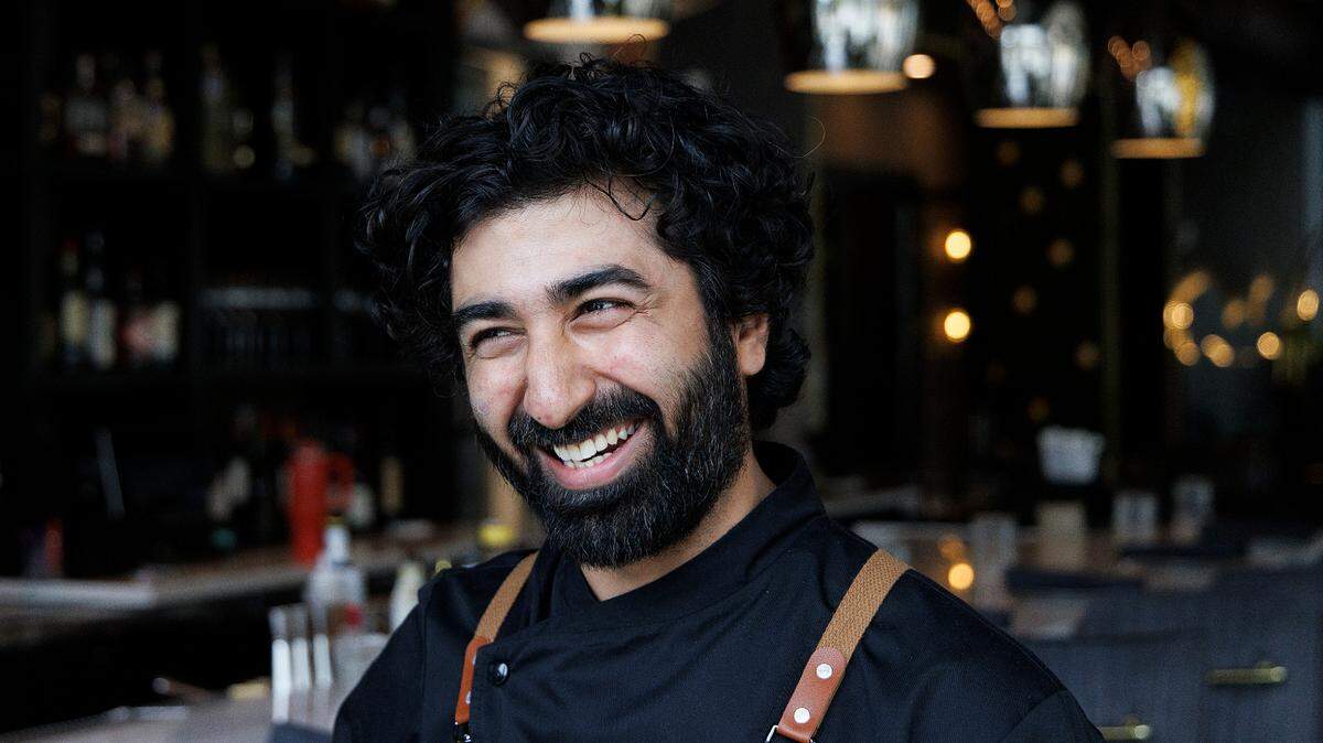 Bhavin Chhatwani, executive chef of Tamasha Modern Indian, smiles while talking about his experience on Wednesday, May 8, 2024, in Raleigh, N.C.