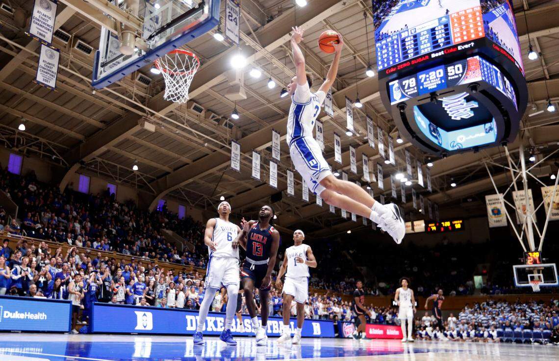 Duke’s Cooper Flagg (2) heads in to slam in two during Duke’s 107-56 exhibition victory over Lincoln (Pa) University at Cameron Indoor Stadium in Durham, N.C., Saturday, Oct. 19, 2024.