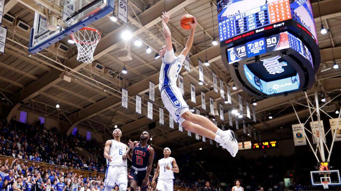 Duke’s Cooper Flagg (2) heads in to slam in two during Duke’s 107-56 exhibition victory over Lincoln (Pa) University at Cameron Indoor Stadium in Durham, N.C., Saturday, Oct. 19, 2024.