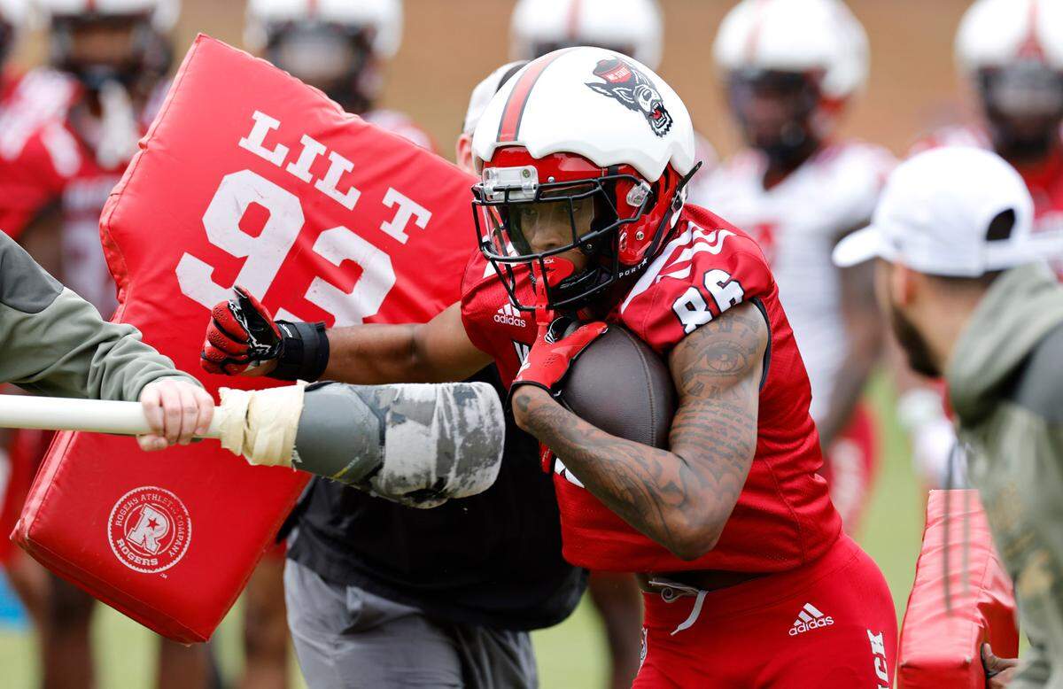 N.C. State wide receiver DJ Collins (86) runs drills during the Wolfpack’s first spring practice in Raleigh, N.C., Wednesday, March 1, 2023.