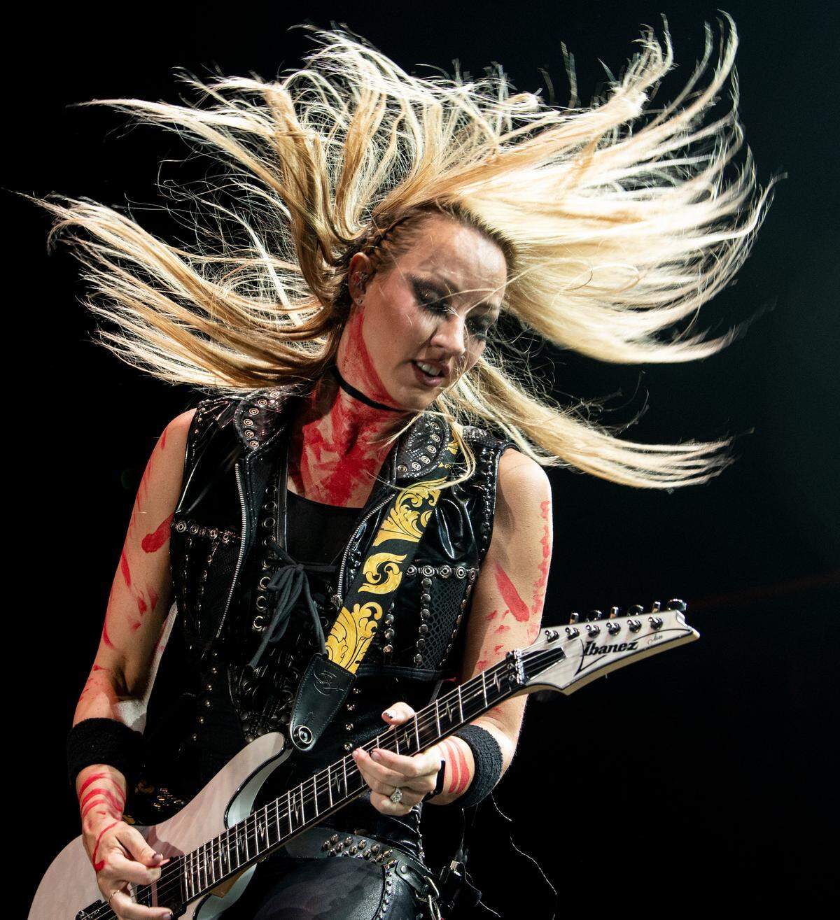 Nita Strauss, guitar player for Alice Cooper performs on the “Freaks On Parade 2023 Tour” to Raleigh, N.C.’s Coastal Credit Union Music Park at Walnut Creek, Tuesday night, Aug. 29, 2023.