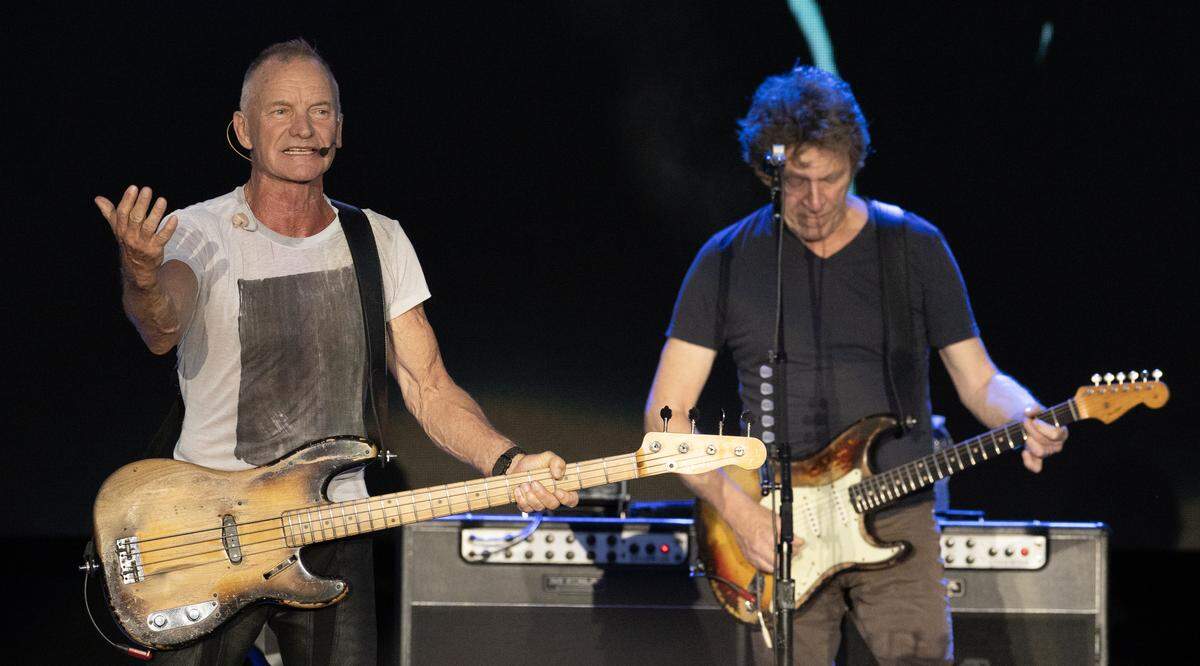 Sting encourages the crowd to sing along to “Message in a Bottle” as he opens the show in Raleigh.