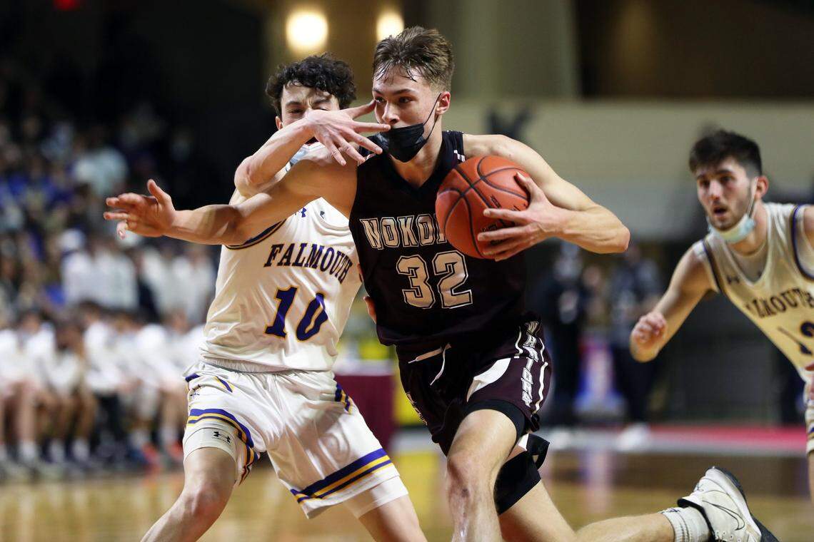 Nokomis’ Cooper Flagg maneuvers around Falmouth’s Judd Armstrong during the Class A state championship on Saturday at Cross Insurance Arena. (Press Herald photo by Ben McCanna/Staff Photographer)