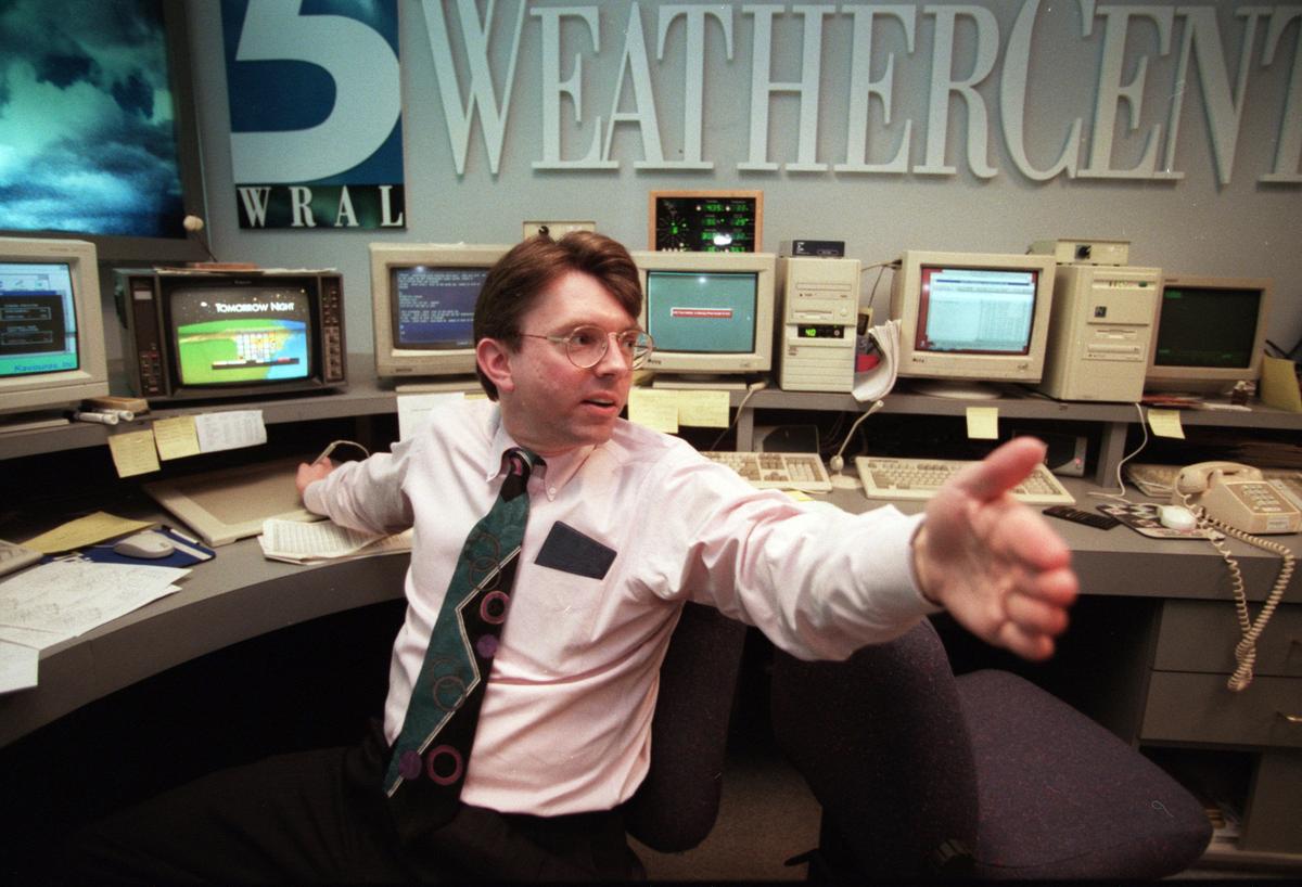 WRAL meteorologist Greg Fishel works on computer graphics in the Weather Center at the WRAL studios in 1997.