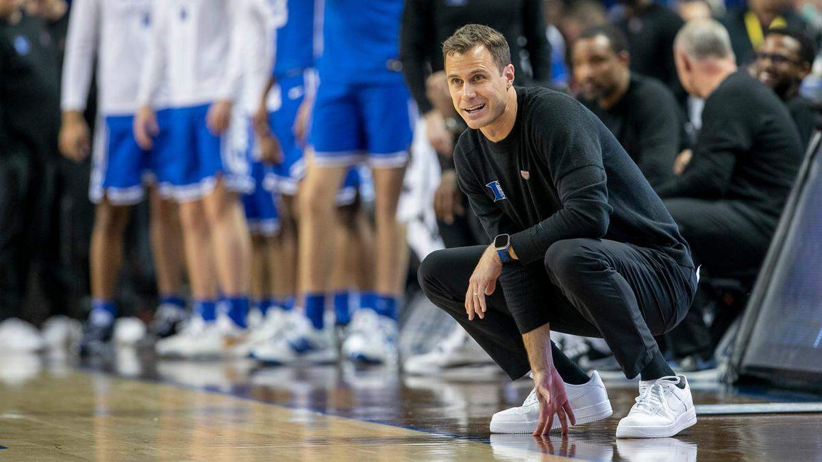 Duke coach Jon Scheyer cracks a smile during the Blue Devils’ 85-78 victory over Miami on Friday, March 10, 2023 at the Greensboro Coliseum in Greensboro, N.C.