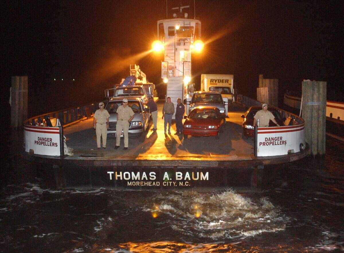 The ferry Thomas A. Baum docks at the ferry landing at Stumpy Point with a load of cars and trucks from Hatteras Village on Sept. 29, 2003. Hatteras Island residents had to take the ferry to the mainland after Hurricane Isabel cut a new 1,000-foot channel just north of town and taking out N.C. 12, cutting them off from the rest of the Outer Banks.