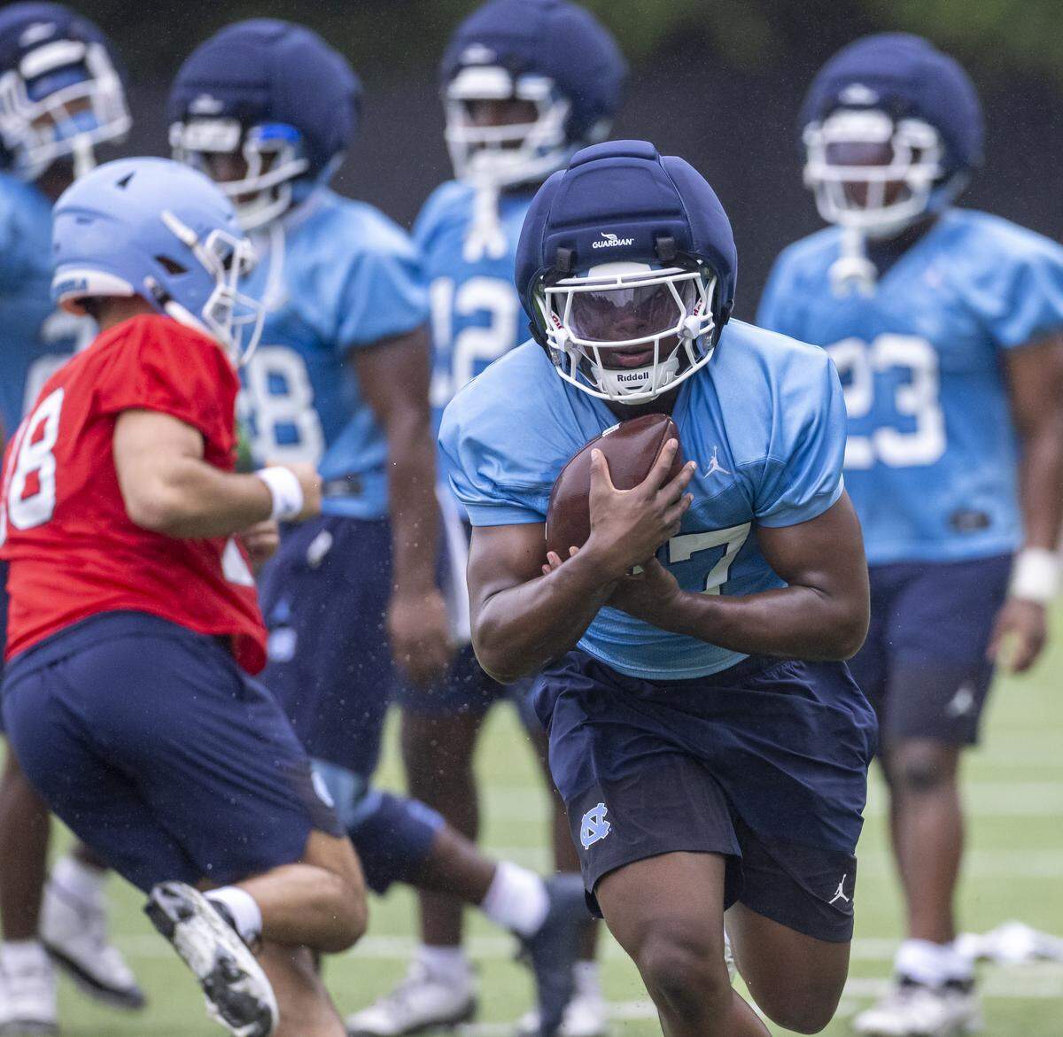 North Carolina running back Jaylen McGill (27) carries the ball during the Tar Heels’ football practice on Saturday, August 2, 2025 in Chapel Hill, N.C.