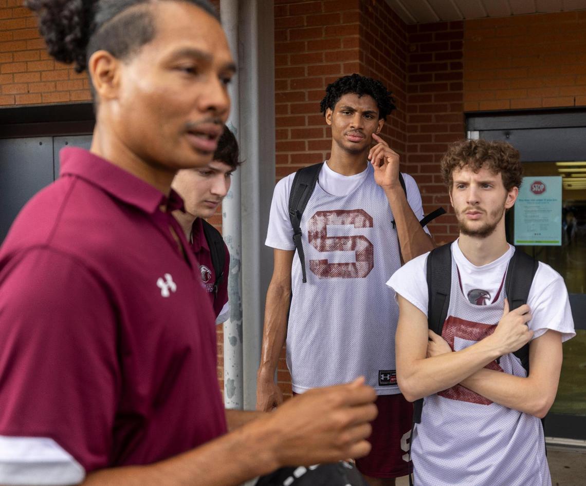 Seaforth High School’s Jarin Stevenson listens to his father and head coach Jarod Stevenson following a scrimmage against Clayton High School on November 12, 2022 at Southeast Raleigh High School in Raleigh, N.C.