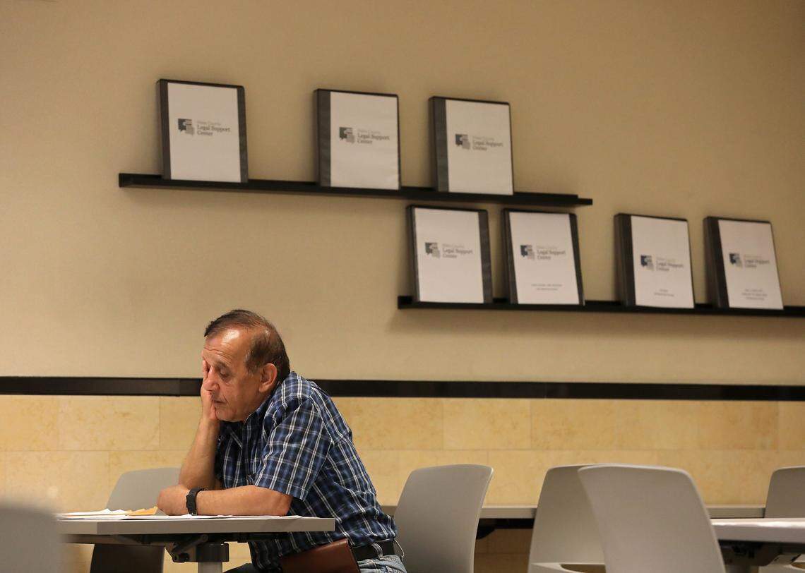 Nasser Vakili-Taleghani sits at a table at the Wake County Legal Support Center on Tuesday, May 16, 2023, in Raleigh, N.C.