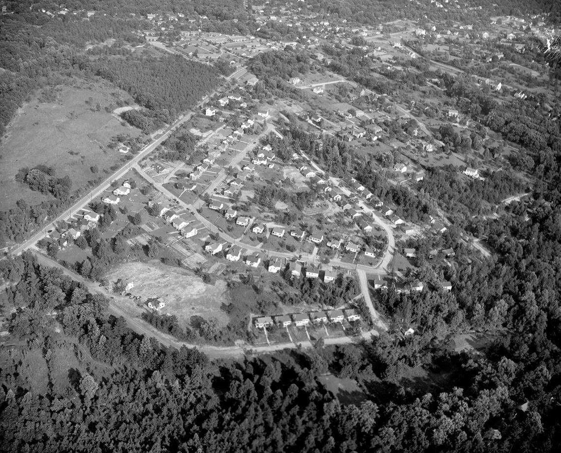 “Starter homes” pop up in the Oberlin Road area of Raleigh in 1948 during the post-World War ll building boom. View looking southwest with Oberlin Road running diagonally on left side of frame. Cartier Drive, Wayland Drive, and Peachtree Street are also seen.