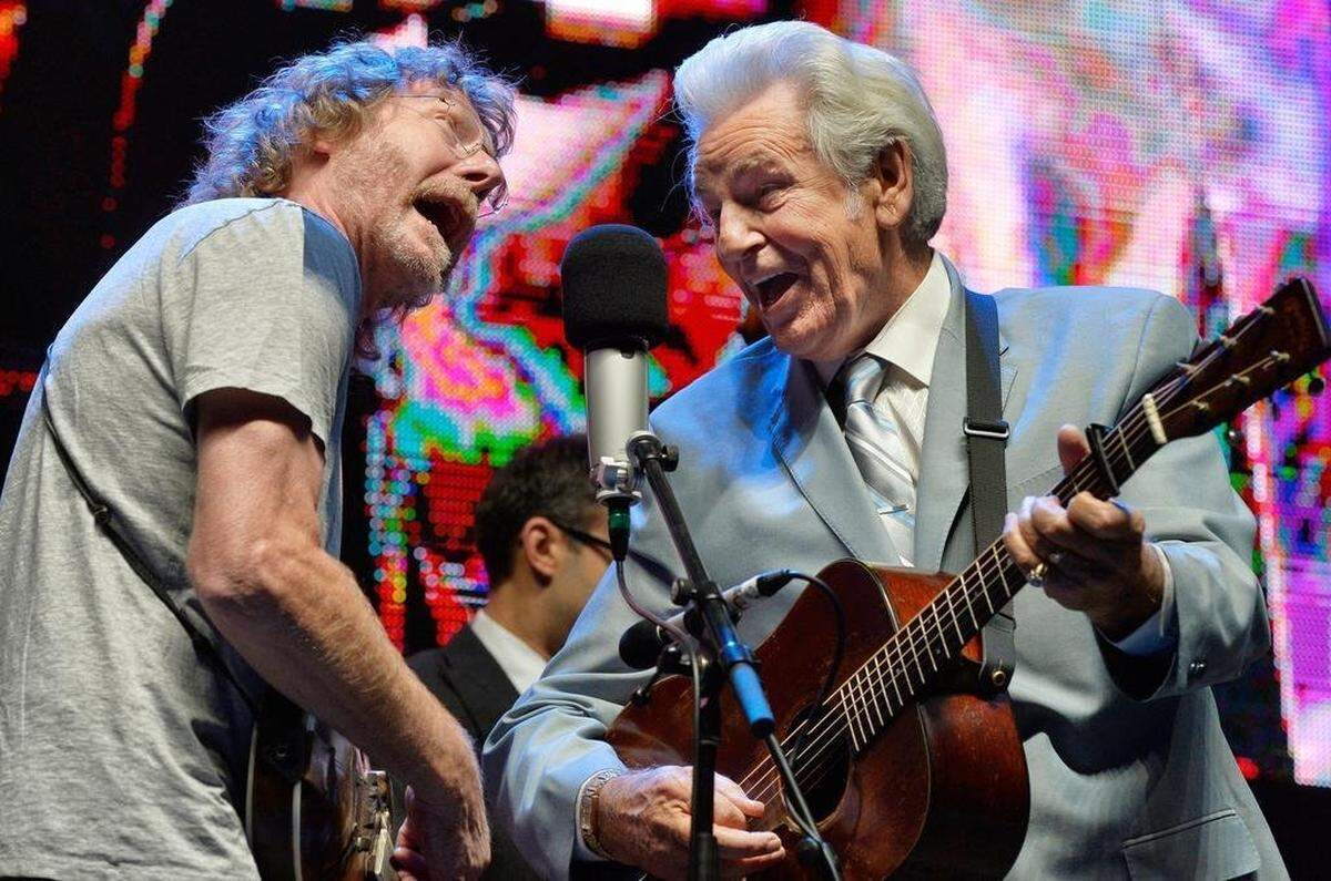 Bluegrass greats Sam Bush (left) on mandolin and Del McCoury (right) perform at a Wide Open Bluegrass concert at Red Hat Amphitheater in 2014. They will perform again on the Red Hat stage Sept. 28, 2019.