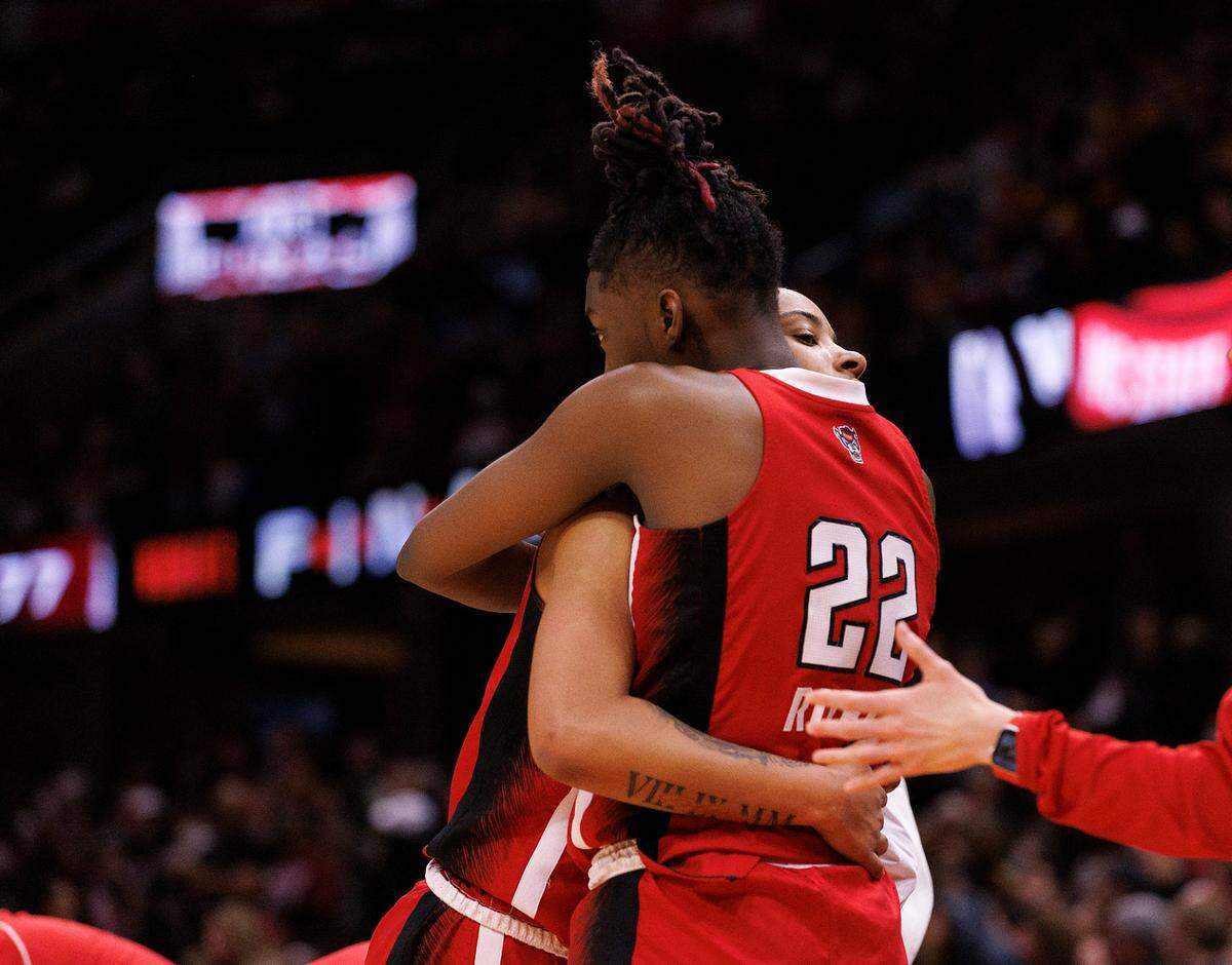 N.C. State’s Aziaha James and Saniya Rivers embrace in the closing minutes of the Wolfpack’s 78-59 Final Four loss to South Carolina at Rocket Mortgage FieldHouse on Friday, April 5, 2024, in Cleveland, Ohio.