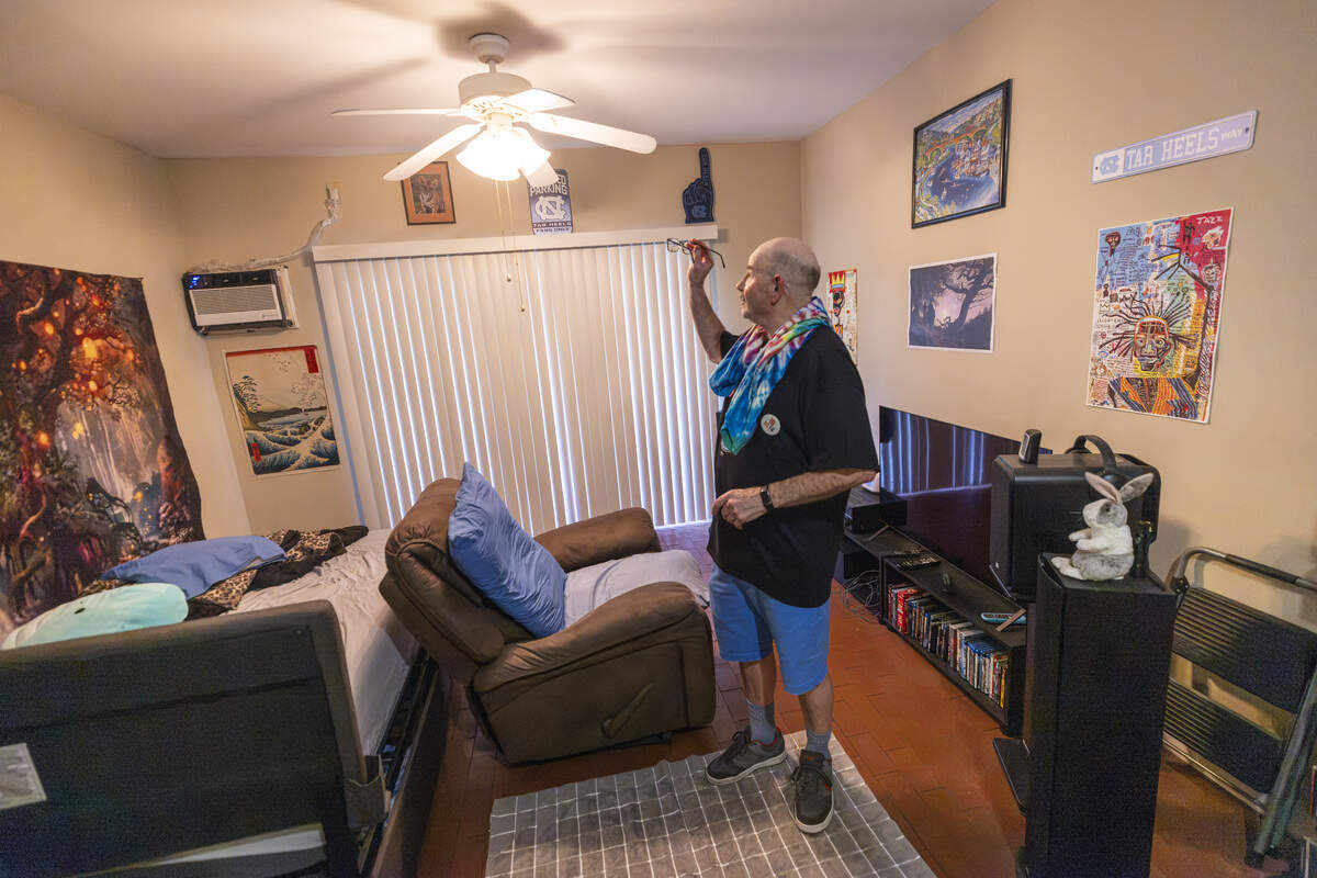 Steve Furman, a 20-year resident of Club Nova Apartments, stands inside his studio apartment in Carrboro. Residents formed a union and held a news conference Wednesday, July 8, 2026, to demand improved housing conditions and management from their nonprofit landlord.